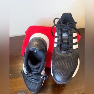 Adidas EUC Golf Womans Tech Response 
Black and White Golf shoes. 
Men 8 woman 9